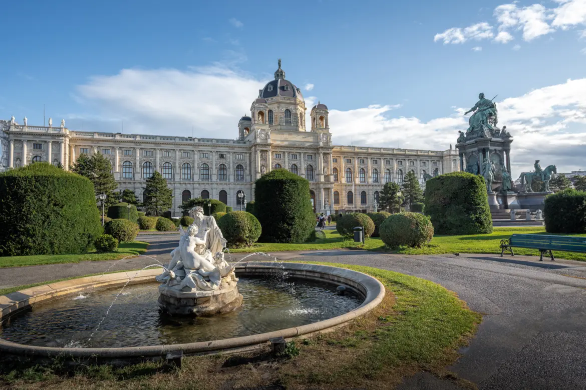 Maria-Theresien-Platz in Vienna with its elegant gardens, fountains, and the Kunsthistorisches Museum rising in the background