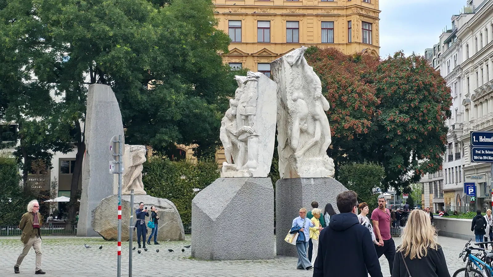 The Memorial Against War and Fascism at Albertinaplatz with passersby, visitors, and everyday city life in Vienna
