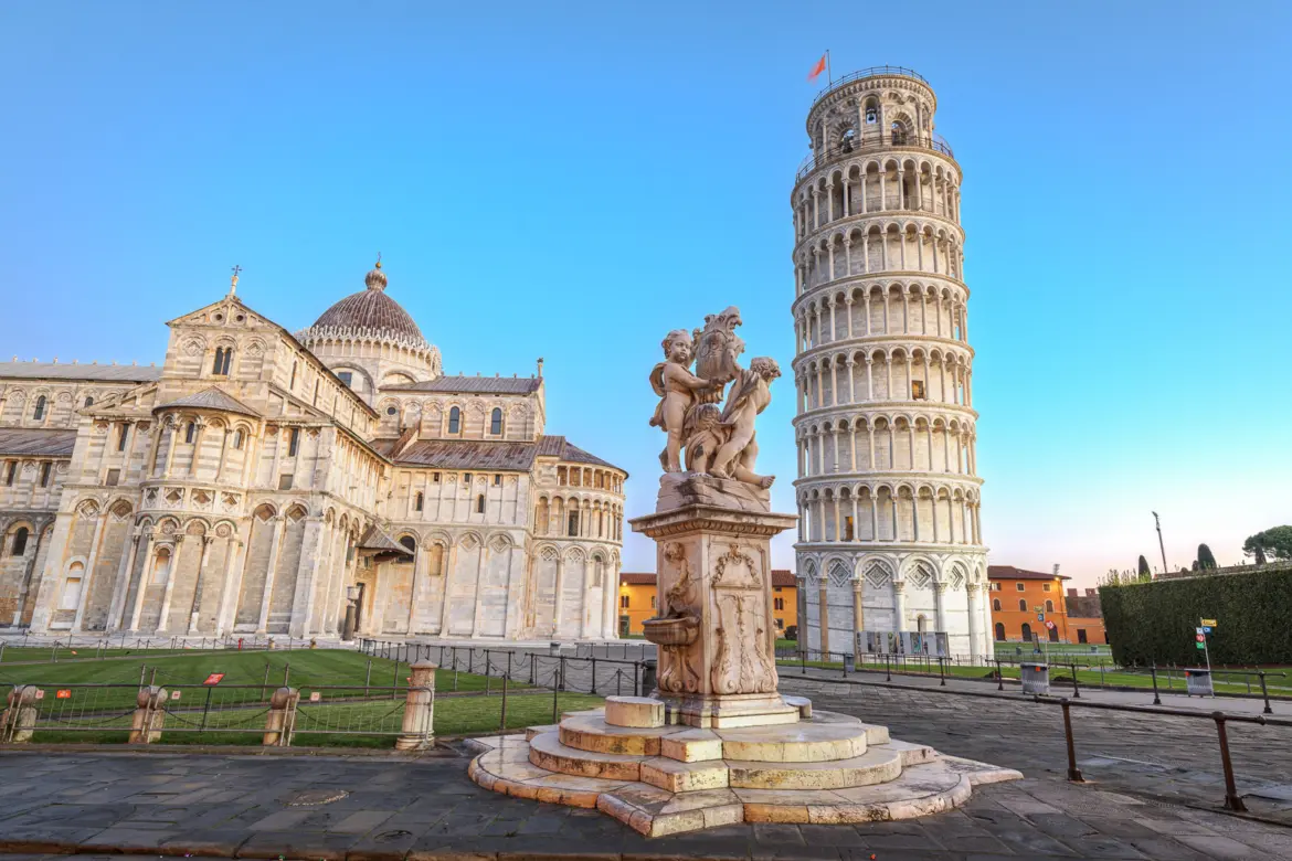 The Leaning Tower of Pisa and Pisa Cathedral in Piazza dei Miracoli, one of Italy’s most iconic Romanesque architectural landmarks