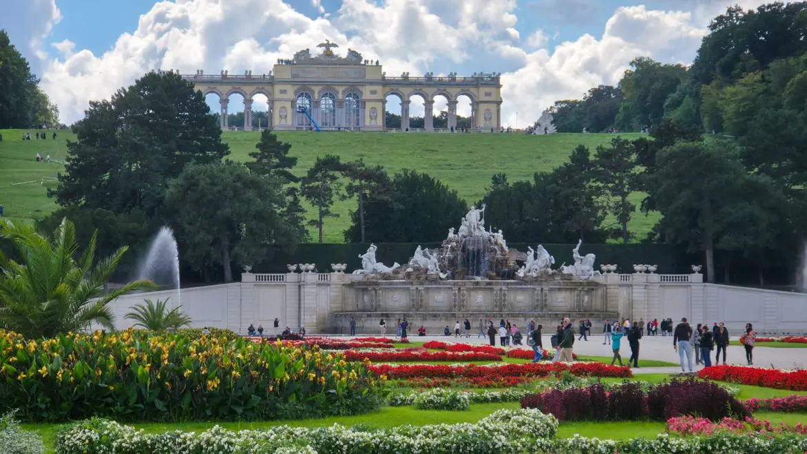 The Neptune Fountain and Gloriette seen together from the Great Parterre in Schönbrunn Gardens, the grand central axis of the imperial landscape