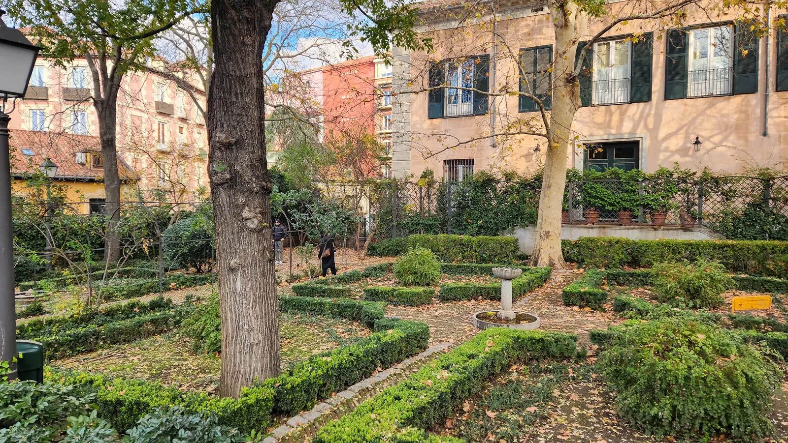 Cobbled pathways and manicured boxwood hedges in the Anglona Garden in La Latina Madrid
