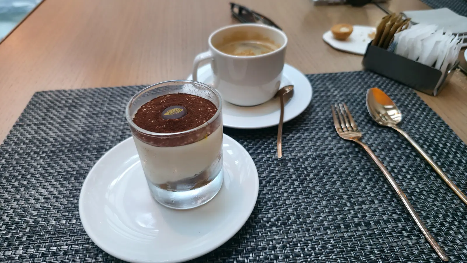 Tiramisu reimagined at Blanc, Mandarin Oriental Barcelona — light, airy, and irresistibly elegant with the perfect dusting of cocoa, crafted with Michelin-level precision and style