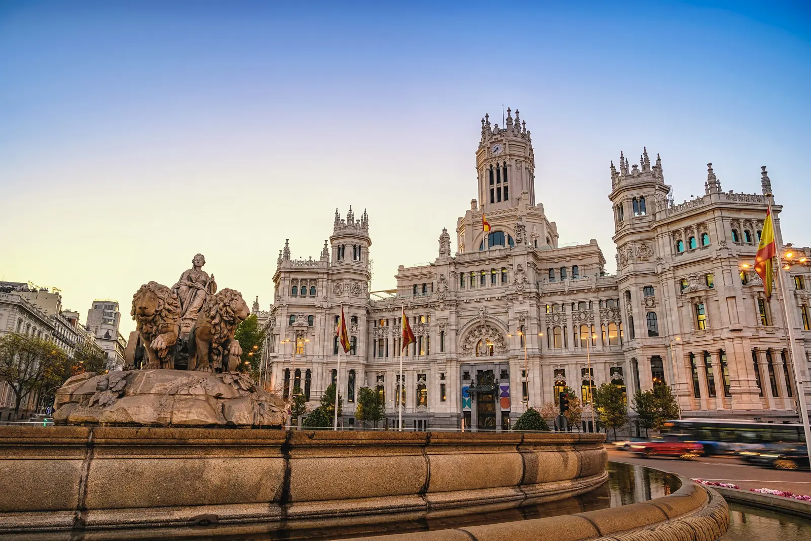 Fountain of Cybele at Plaza de Cibeles in Madrid with the Palacio de Cibeles in the background