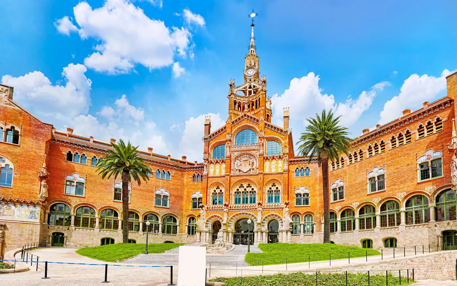 The Hospital de la Santa Creu i Sant Pau in Barcelona, Lluís Domènech i Montaner's modernista masterpiece — a UNESCO World Heritage Site with domes, mosaics, and pavilions that feel like an open-air palace