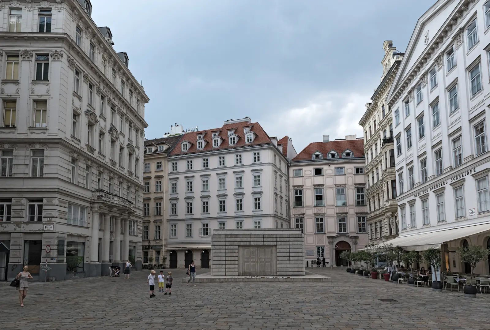Judenplatz in Vienna captured in a quiet, contemplative moment, showing the serene atmosphere and historic surroundings of this reflective square