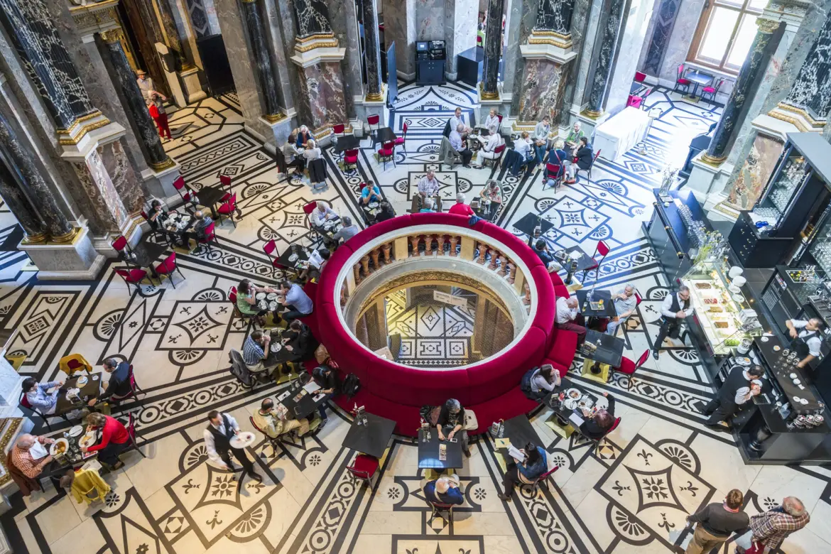View from an upper floor of the Kunsthistorisches Museum Vienna overlooking the Café-Restaurant in the rotunda beneath the grand cupola
