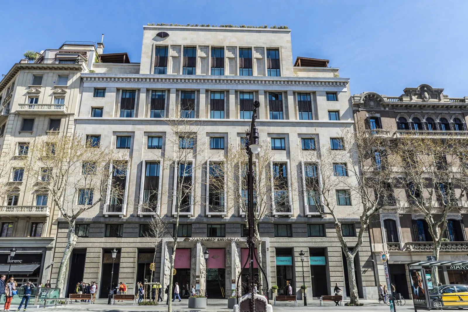 The discreet exterior of the Mandarin Oriental hotel on Passeig de Gràcia in Barcelona's Eixample district, one of the city's most glamorous boulevards near Casa Batlló and La Pedrera