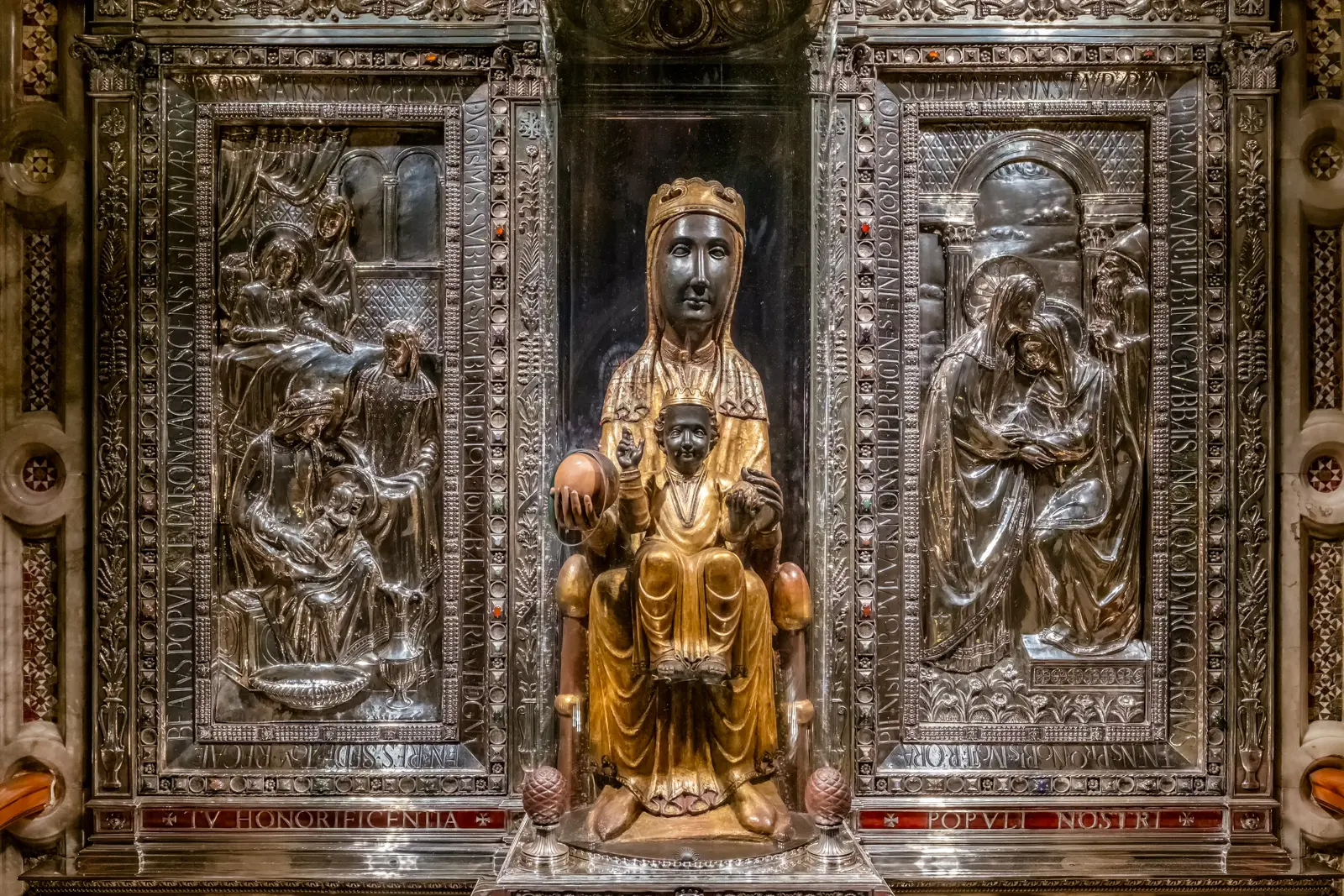 La Moreneta, the 12th-century Black Madonna of Montserrat, seated on her gilded throne inside the basilica — patroness of Catalonia and one of Europe's most venerated Black Madonna statues