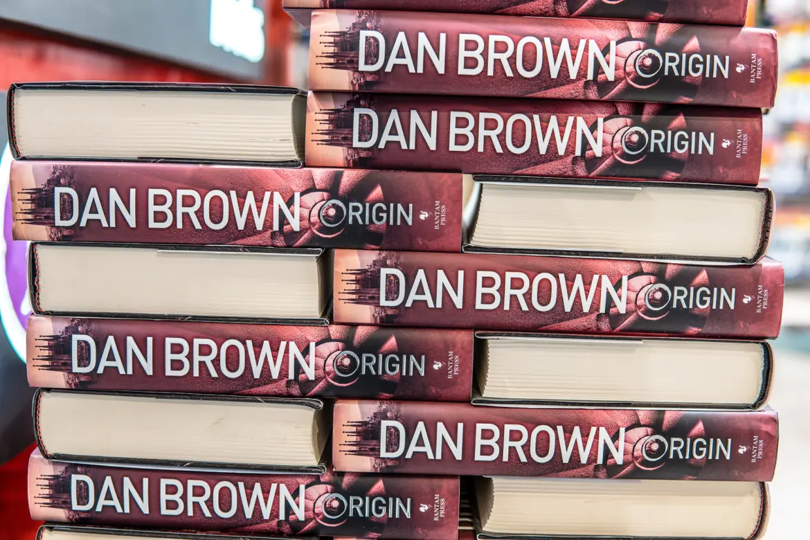 The cover of Origin by Dan Brown (2017), the fifth Robert Langdon novel set in Barcelona, exploring themes of science, faith, and the future of humanity through Gaudí's architecture