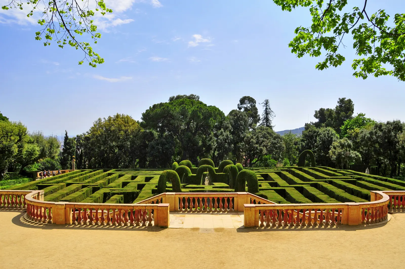 Parc del Laberint d'Horta in Barcelona, the city's oldest neoclassical garden with cypress hedge labyrinth, mythological sculptures, and reflective lakes — a contemplative space for literary wanderers