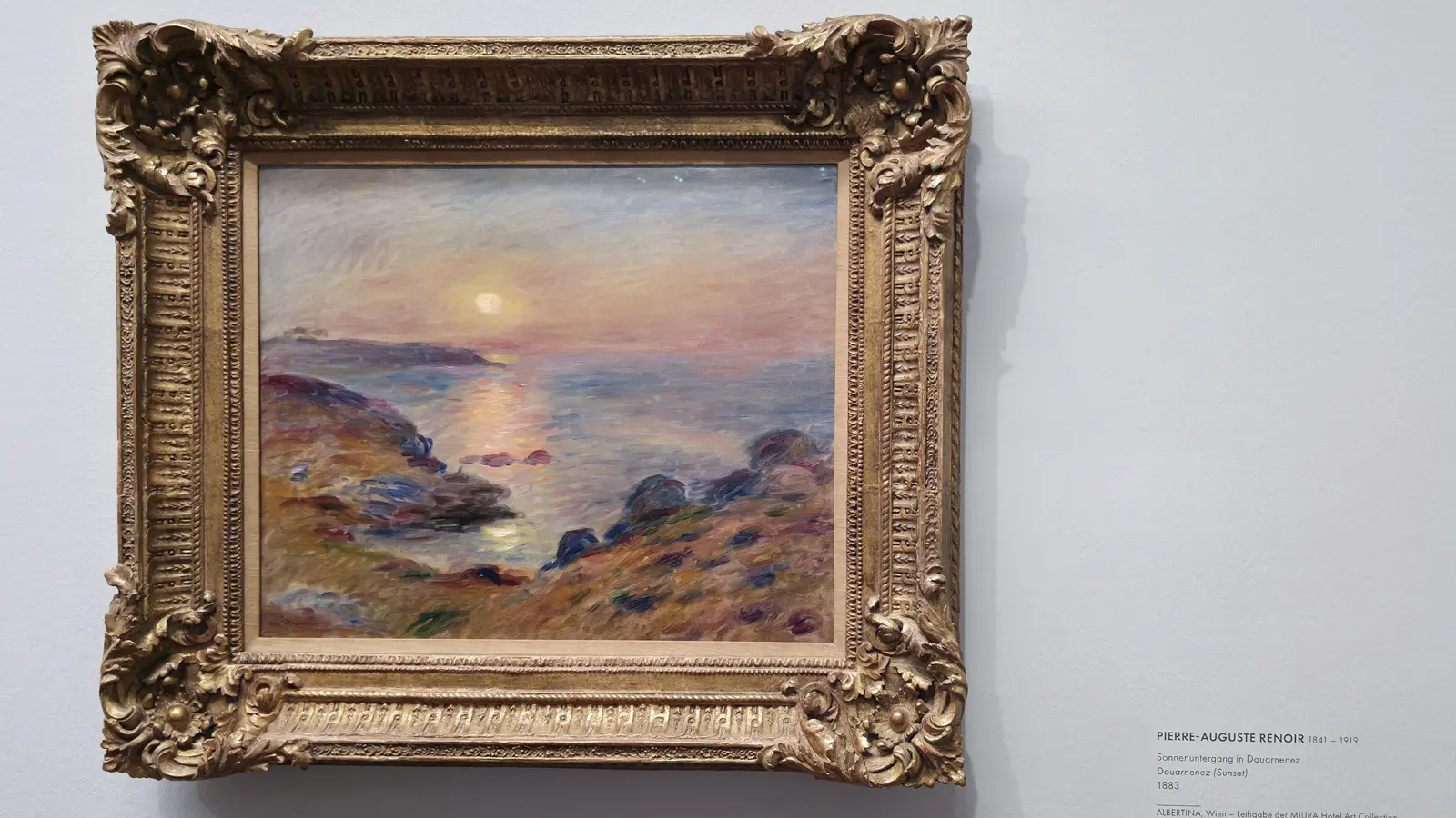 Pierre-Auguste Renoir's The Douarnenez (Sunset) at the Albertina Museum in Vienna, bathed in warm glowing light from the Batliner Collection