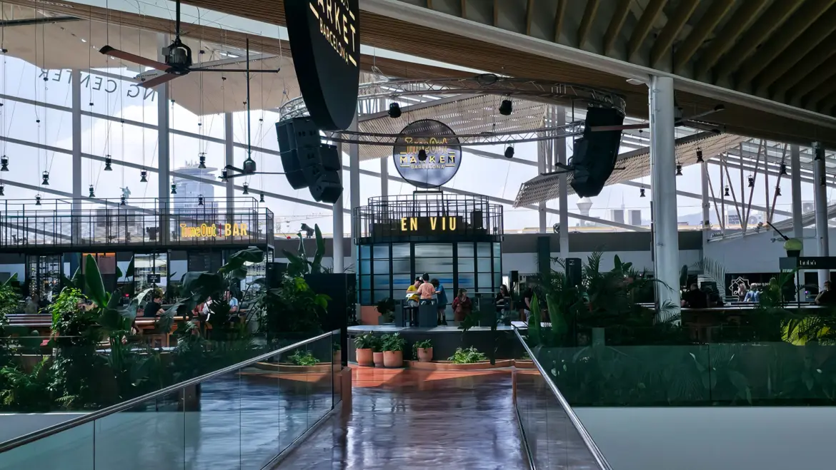 Time Out Market Barcelona at Port Vell — a curated food hall inside the Maremagnum complex, gathering some of the city's best chefs under one roof with open kitchens and communal seating