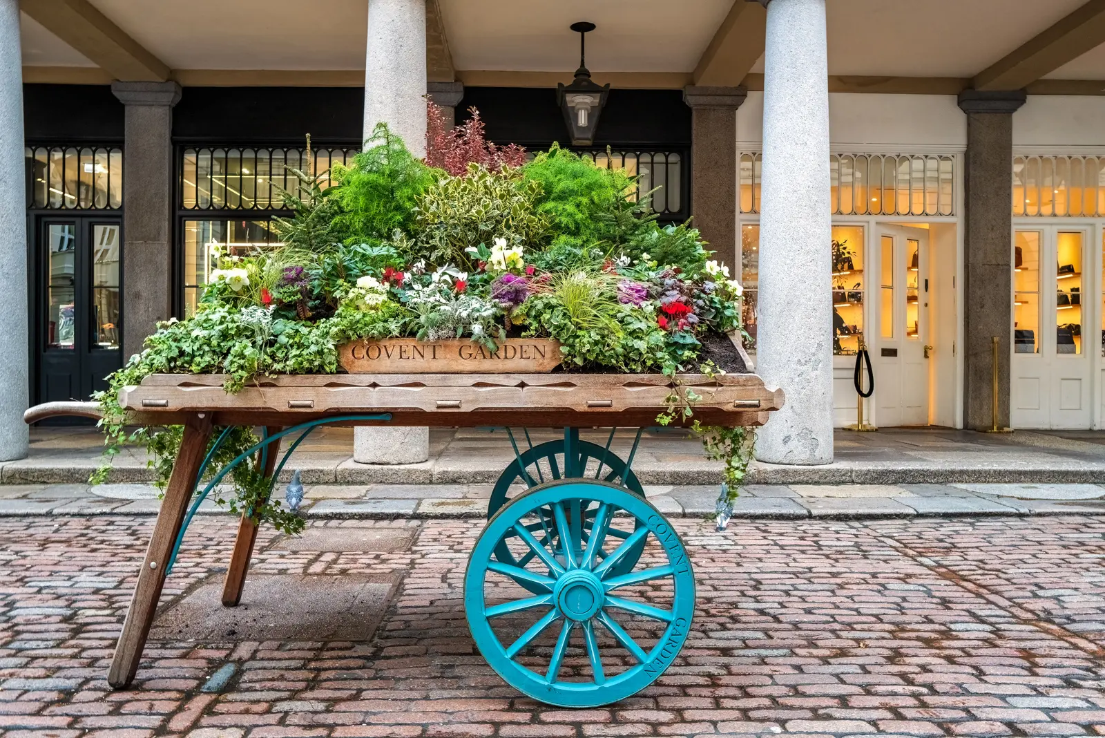 Beautiful floral installation decorating Covent Garden in London, reflecting the neighbourhood's colourful atmosphere, historic market heritage, and creative seasonal displays