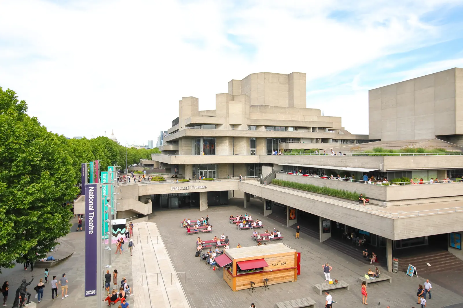 The National Theatre on the South Bank, designed by Denys Lasdun and completed in 1976, is one of London's best-known Brutalist buildings. The building holds three auditoriums - the Olivier (1,160 seats), Lyttelton (890) and Dorfman (400) - and was Grade II listed in 1994