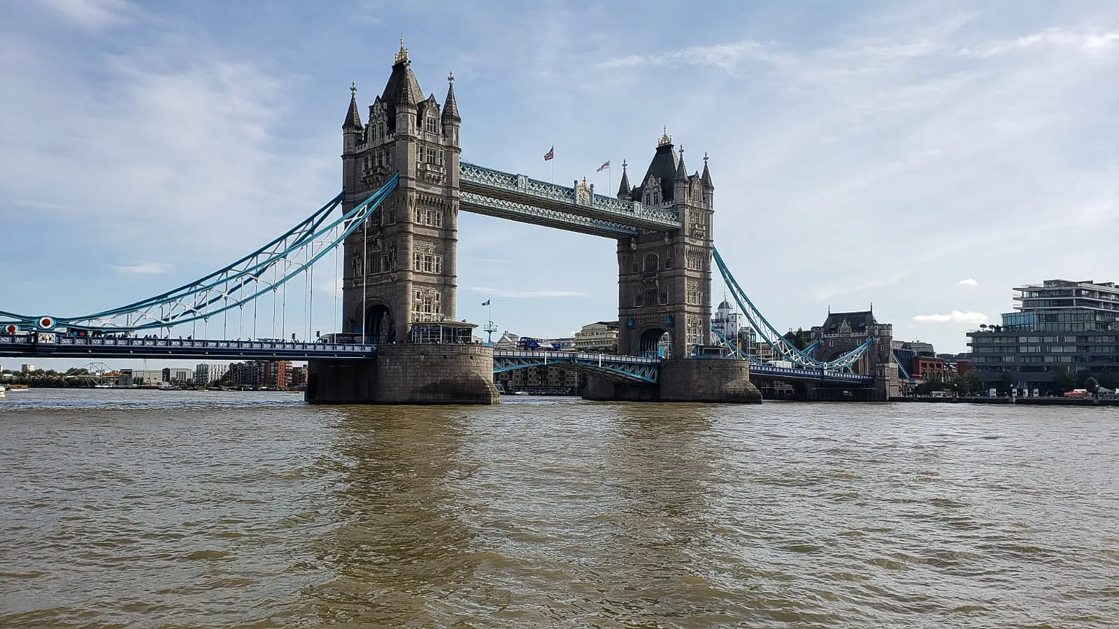 View of Tower Bridge and the River Thames near the Tower of London in London, where medieval history and Victorian engineering meet along London's iconic waterfront
