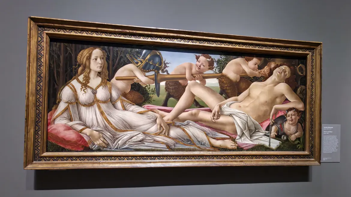 Botticelli's Venus and Mars at the National Gallery, London: Venus reclining awake while Mars sleeps among baby satyrs playing with his armour.
