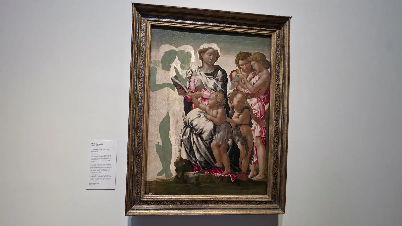 Michelangelo's unfinished Manchester Madonna at the National Gallery, London, with the two angels at the left still only flat green underpainting.