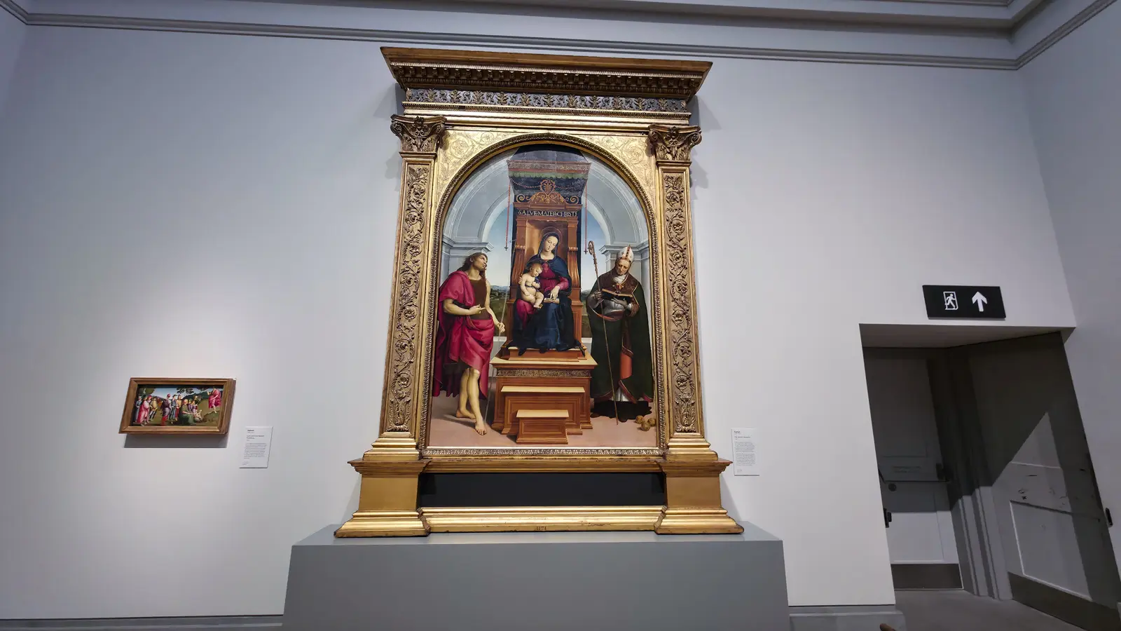 Raphael's Ansidei Madonna at the National Gallery, London, the Virgin and Child enthroned between Saint John the Baptist and Saint Nicholas of Bari.