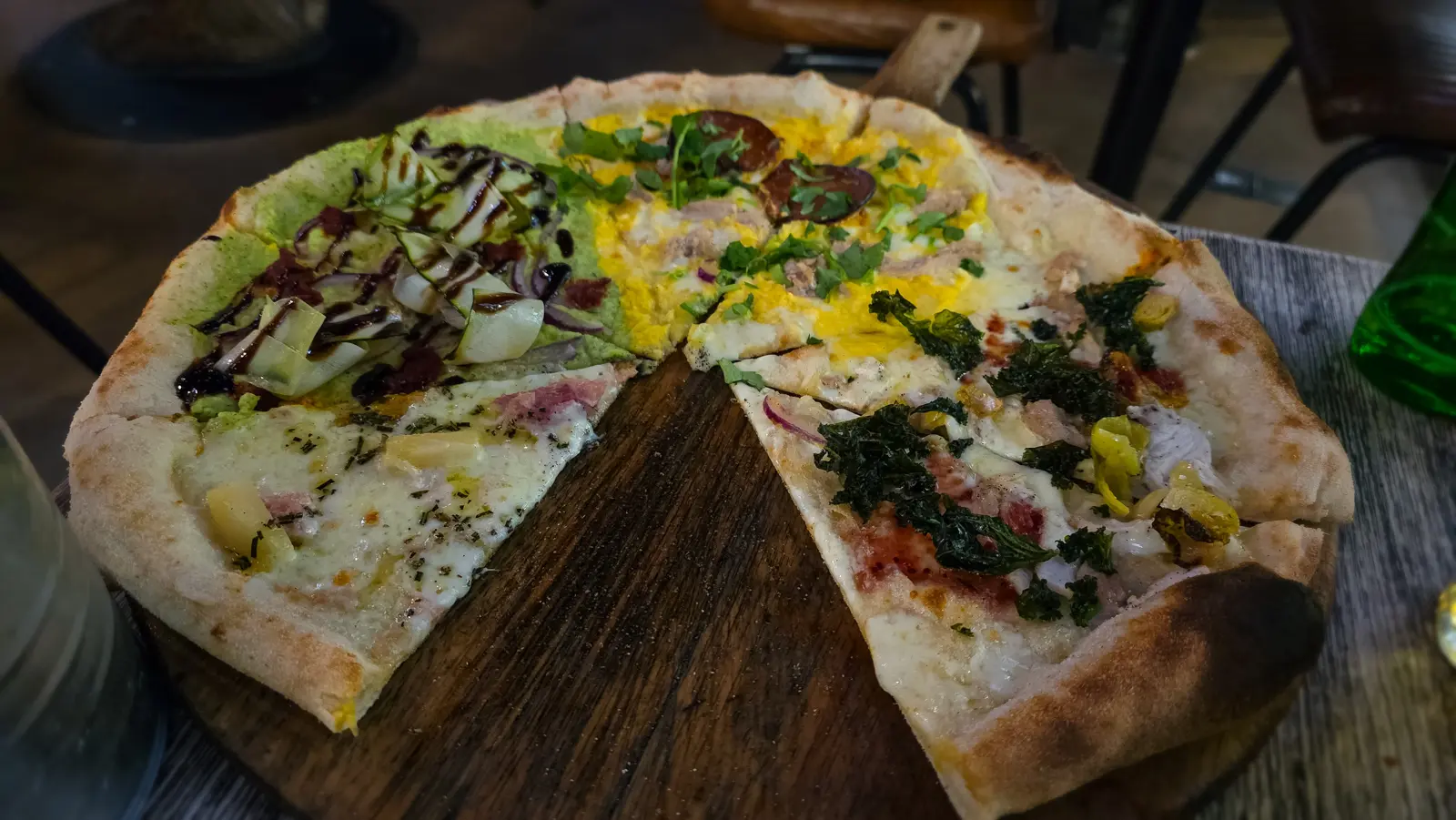 A thin, sourdough-crust pizza at Street Pizza by Gordon Ramsay, London, topped with mozzarella, herbs and chorizo