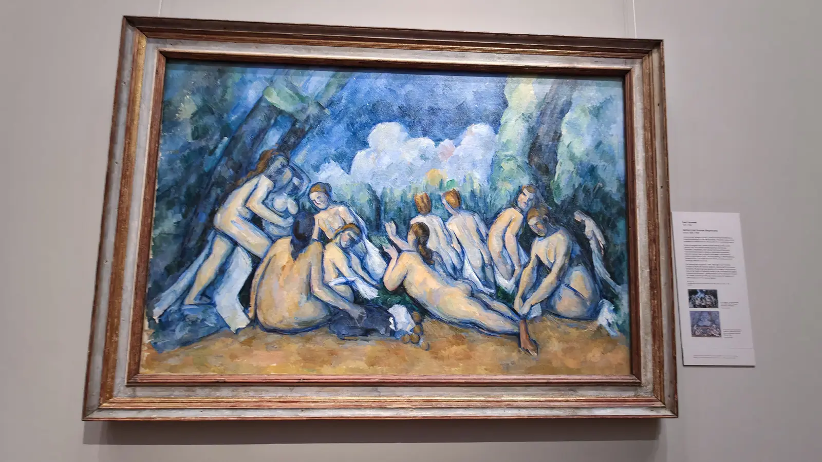 Cézanne's Bathers, eleven nude women in a blue and ochre woodland glade, at the National Gallery, London