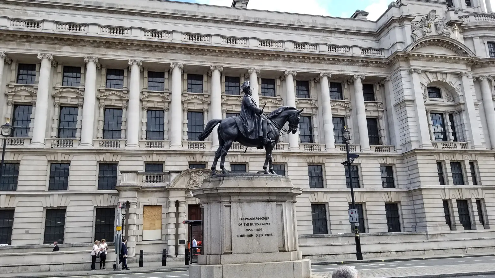 The equestrian statue of the Duke of Cambridge on Whitehall, the Old War Office building behind, London