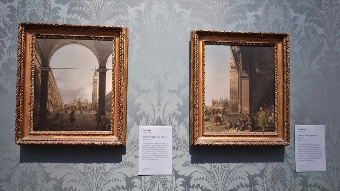 Canaletto's small upright views of Piazza San Marco, framed through an arch, in the National Gallery's Wolfson Room, London