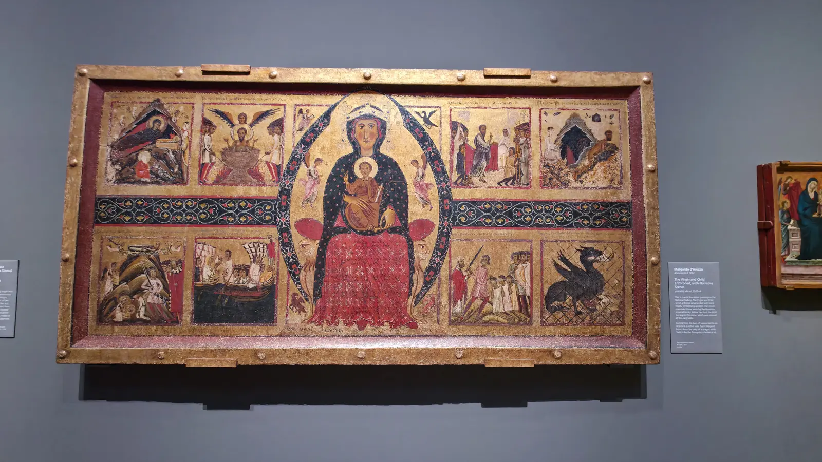 The Virgin and Child Enthroned, with Narrative Scenes by Margarito d'Arezzo, the enthroned pair in a gold mandorla ringed by small panels of saints' ordeals, National Gallery, London.