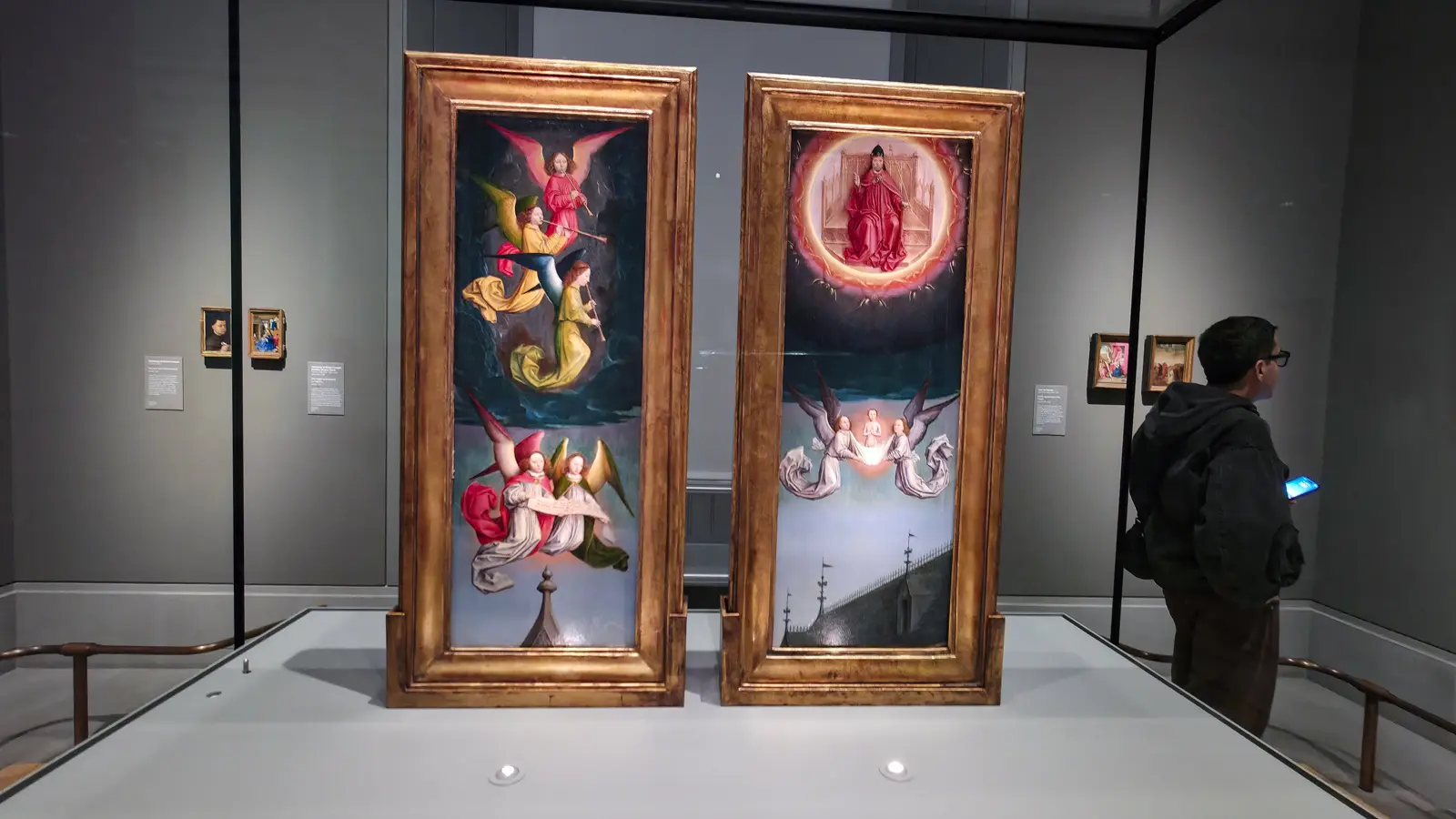 Fragments of shutters from the St Bertin Altarpiece by Simon Marmion: musician angels and a fiery heaven, National Gallery, London.