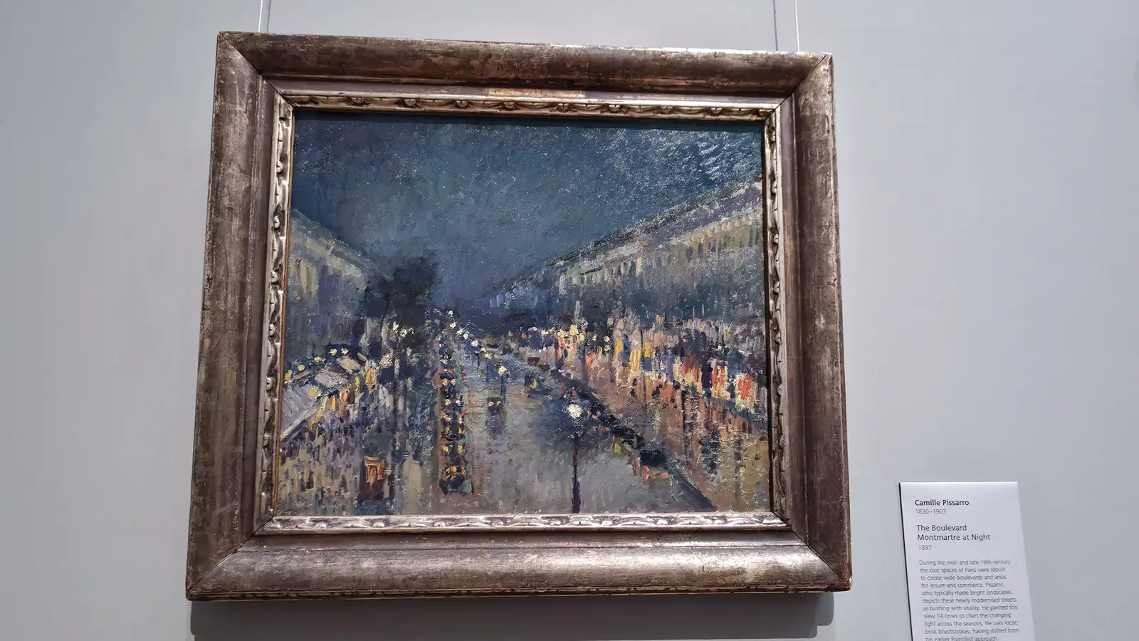Pissarro's The Boulevard Montmartre at Night, a gaslit Paris street glowing in the dark, National Gallery, London