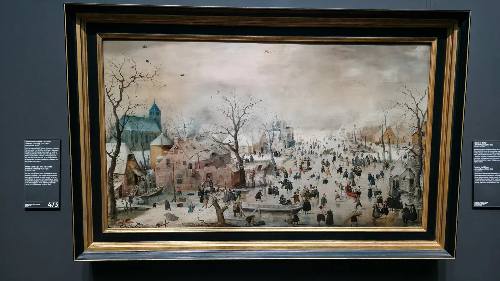 Hendrick Avercamp’s Winter Landscape with Ice Skaters at the Rijksmuseum, hundreds of small figures on a frozen waterway before a village