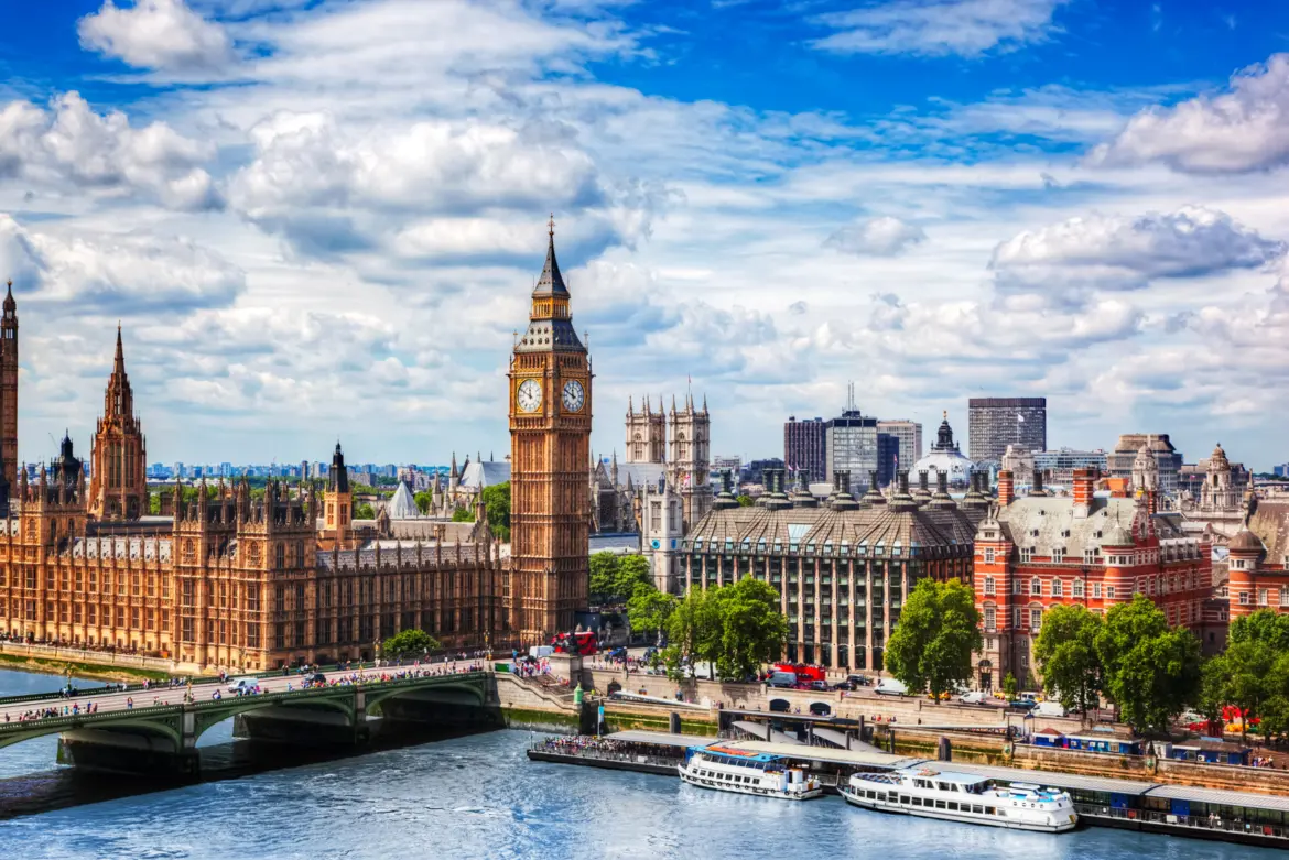 The Houses of Parliament and the Elizabeth Tower, home to Big Ben, above Westminster Bridge and the River Thames in central London