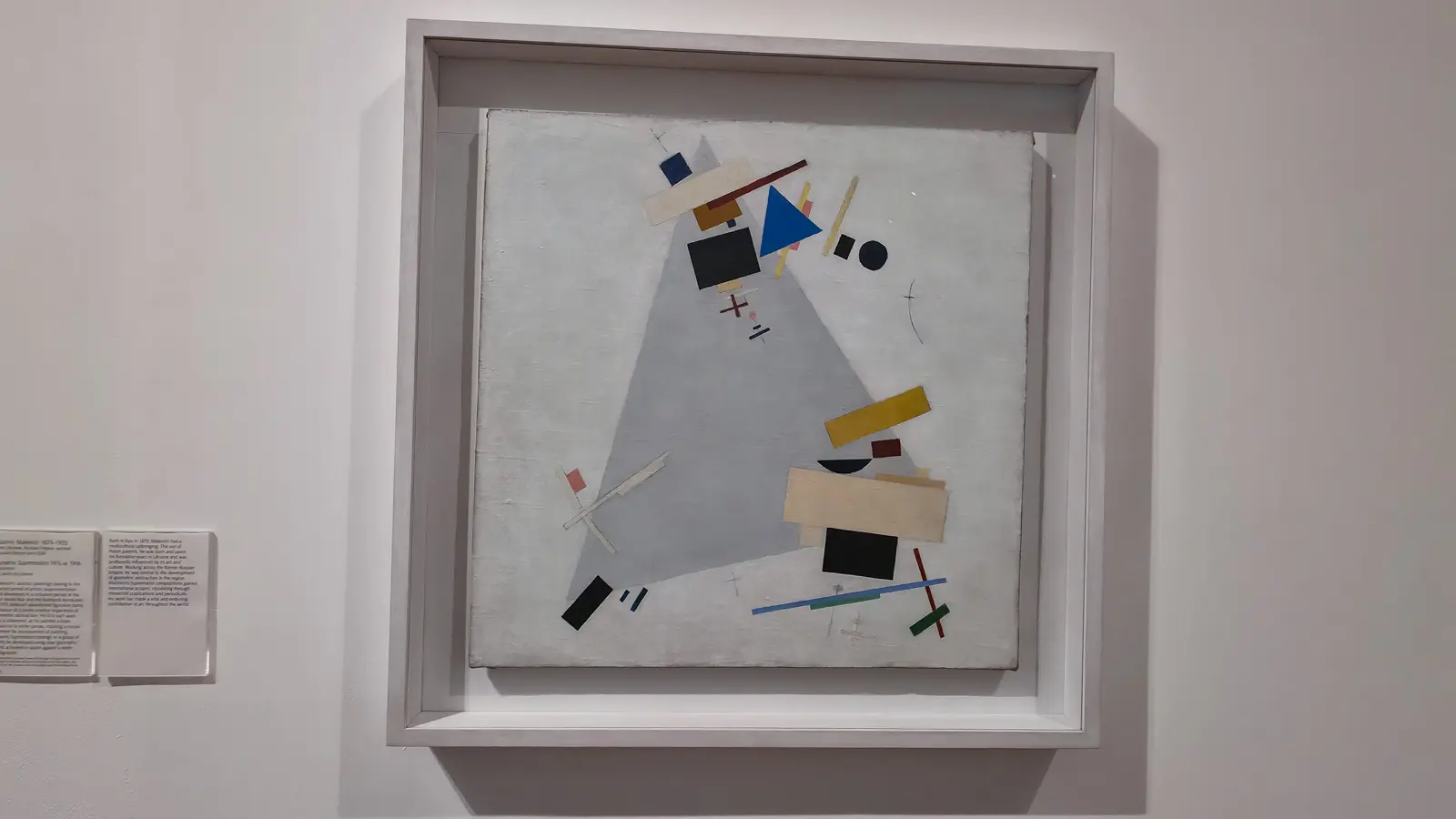 Kazimir Malevich’s Dynamic Suprematism (1915 or 1916) at Tate Modern, coloured bars and shapes scattered across a pale ground