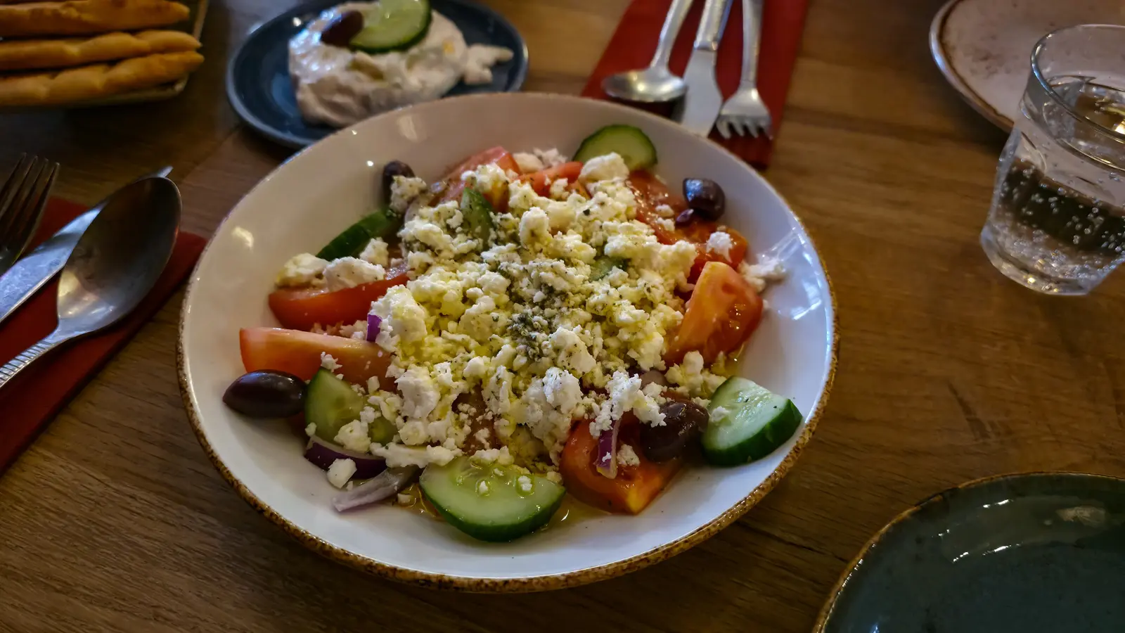 A Greek salad at Oresti’s Taverna with tomato, cucumber, red onion, kalamata olives and crumbled feta in olive oil