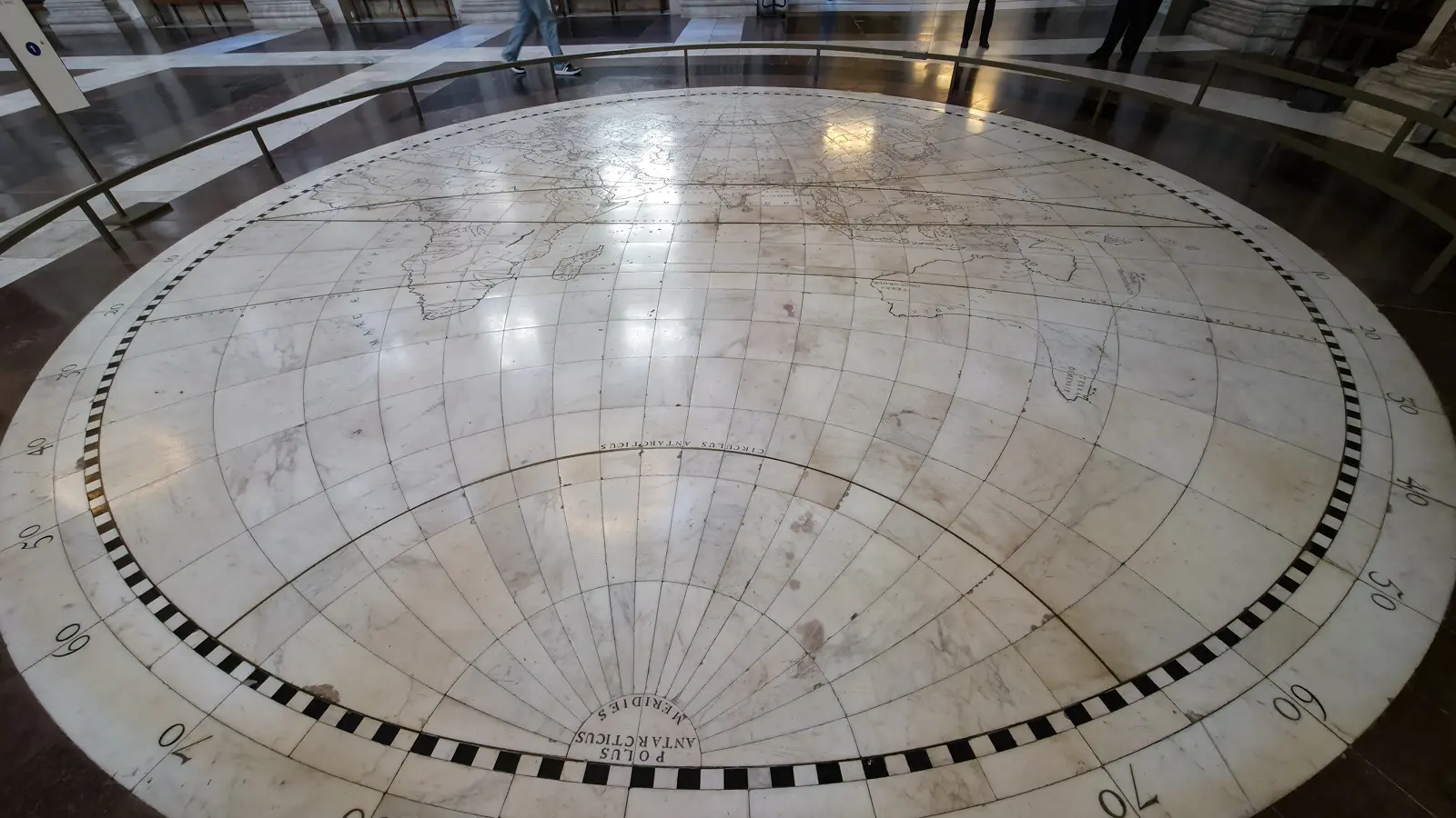 The inlaid marble floor map in the Citizens’ Hall of the Royal Palace Amsterdam, showing a hemisphere with Latin lettering