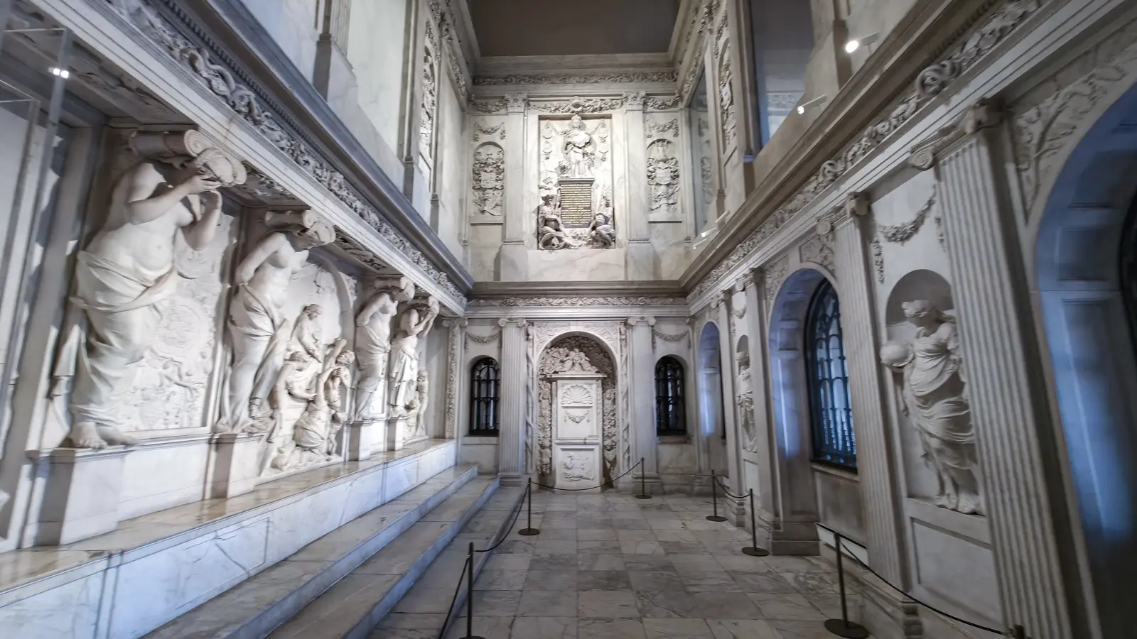 The Vierschaar or Tribunal in the Royal Palace Amsterdam, a marble chamber with caryatid figures along the left wall
