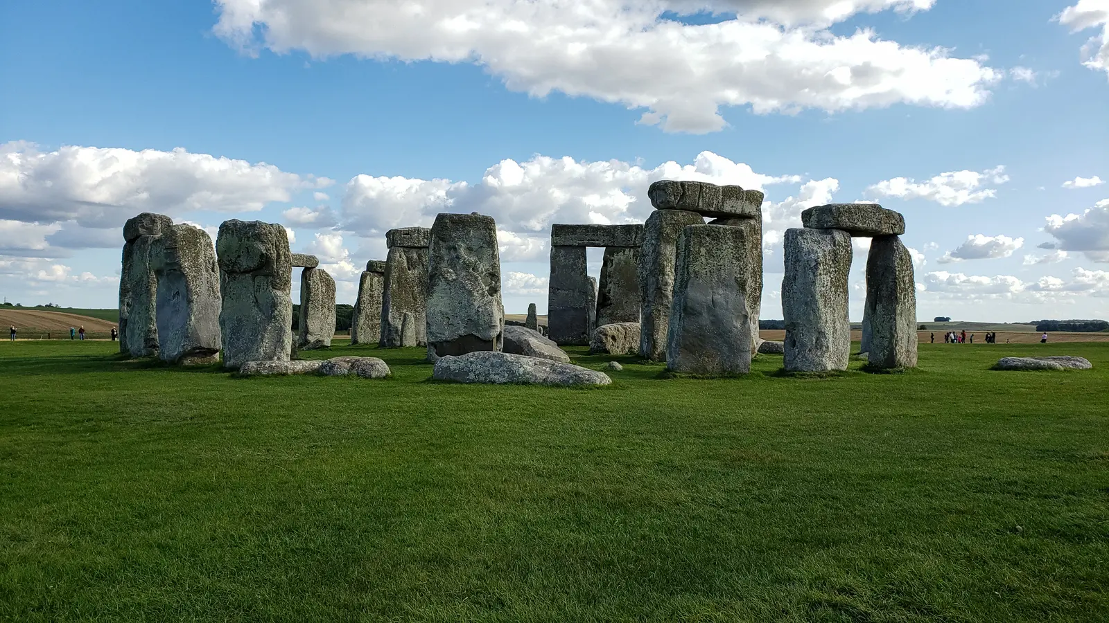 The stone circle at Stonehenge on Salisbury Plain, ringed by open chalk downland, an easy day trip from London