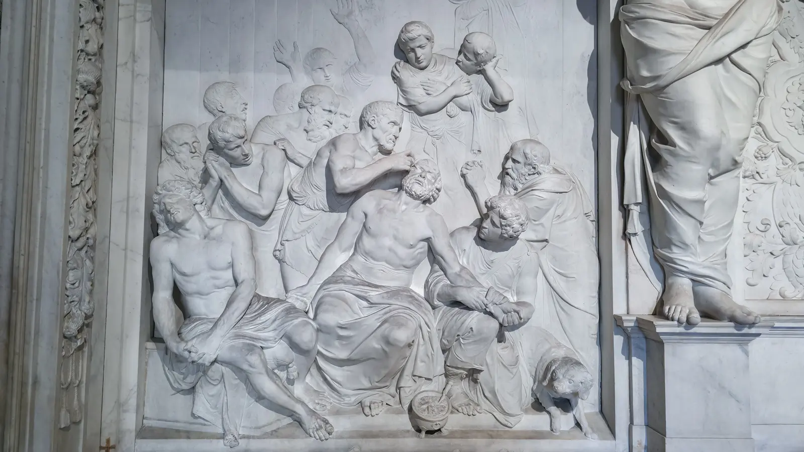 Marble relief of the judgement of Zaleucus in the Vierschaar, Royal Palace Amsterdam, with onlookers and a small dog at the foot