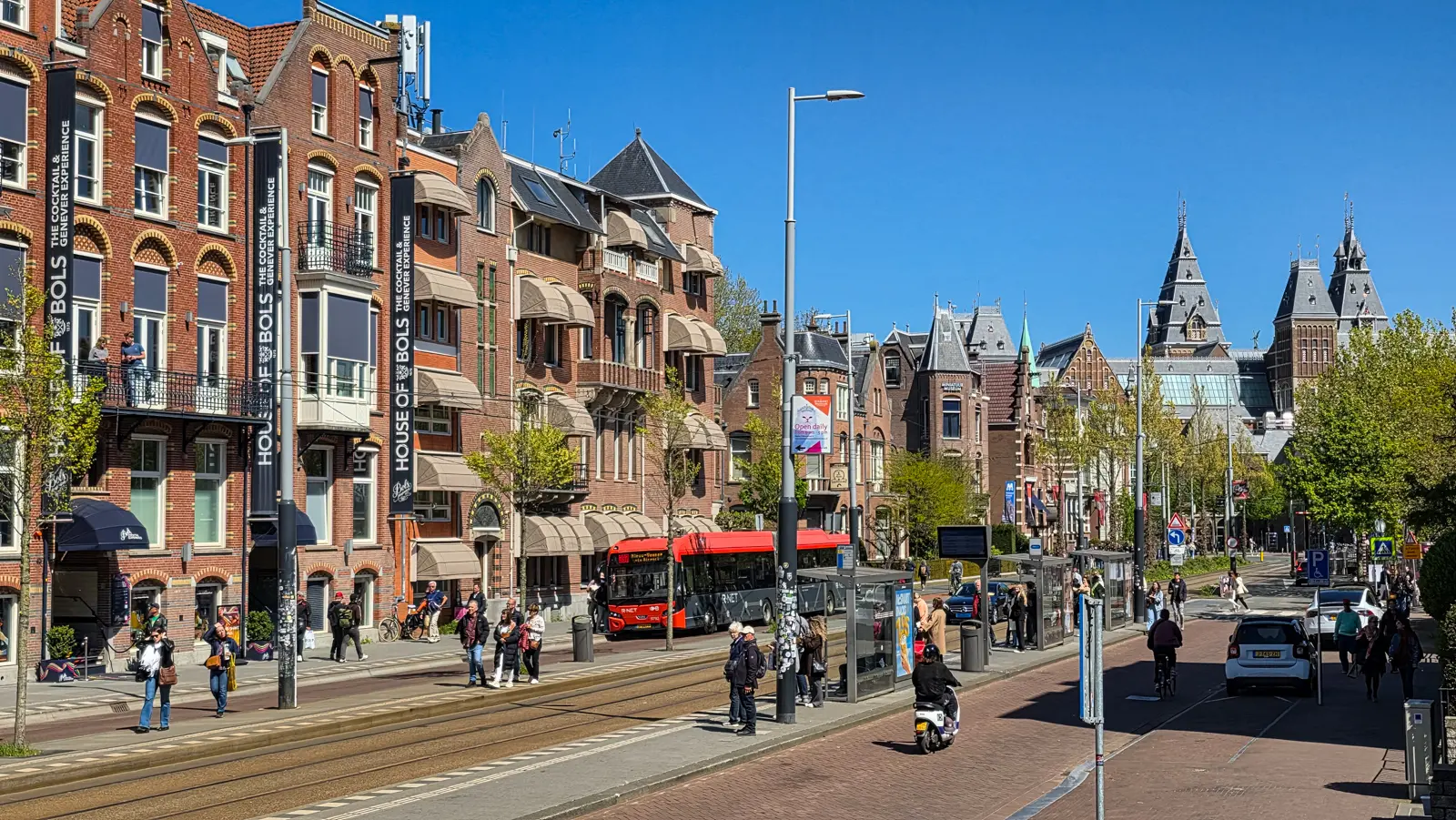 Paulus Potterstraat looking towards the Rijksmuseum towers, with brick houses and tram tracks, Amsterdam