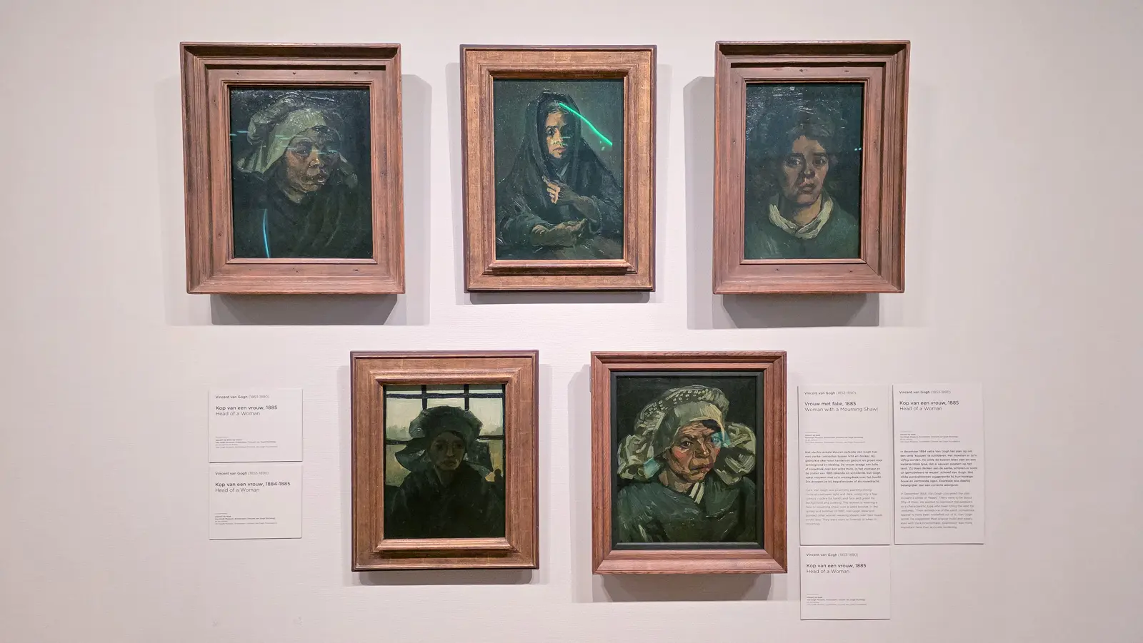 Five Van Gogh studies of peasant heads, 1884 to 1885, four women and one more, hung together in identical pale frames, Van Gogh Museum, Amsterdam