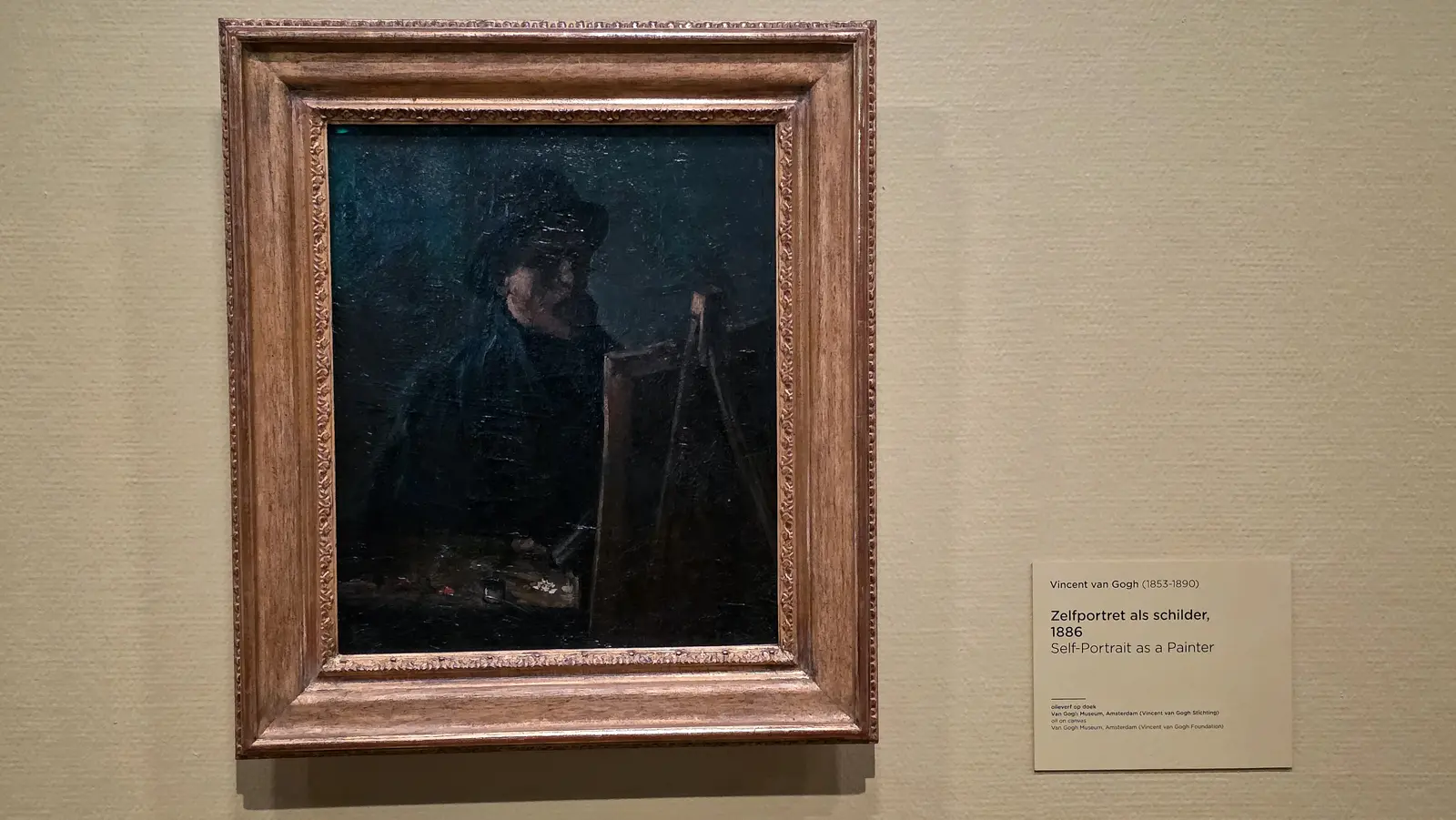 Self-Portrait as a Painter, 1886, showing Van Gogh at his easel almost entirely in shadow, Van Gogh Museum