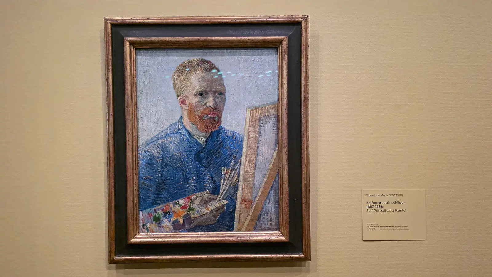 Self-Portrait as a Painter, 1887-1888, Van Gogh in a blue smock at his easel holding a palette of complementary colours, Amsterdam