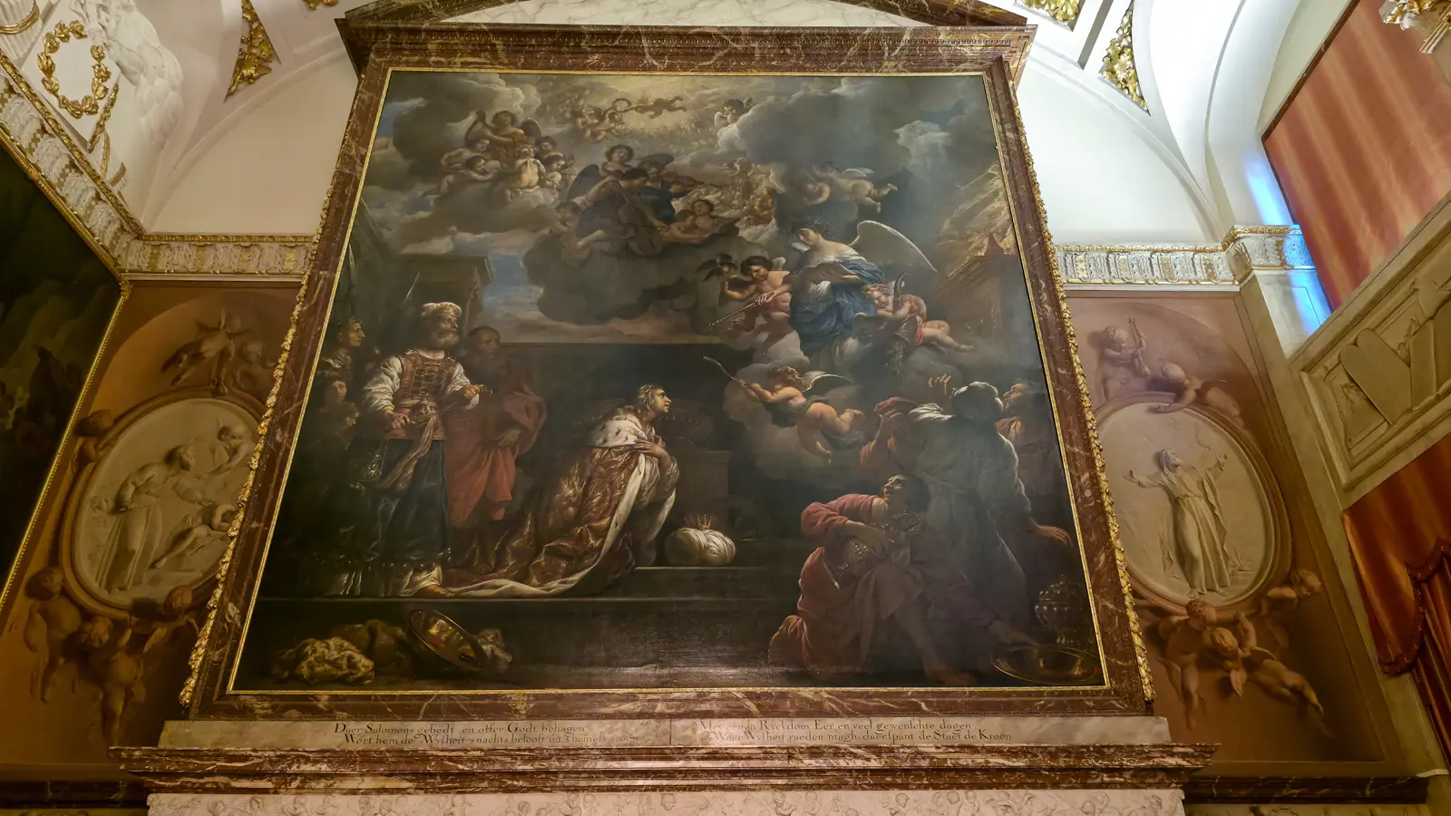 Govert Flinck's painting of Solomon praying for wisdom above a marble chimneypiece in the Royal Palace Amsterdam, with Dutch verses beneath