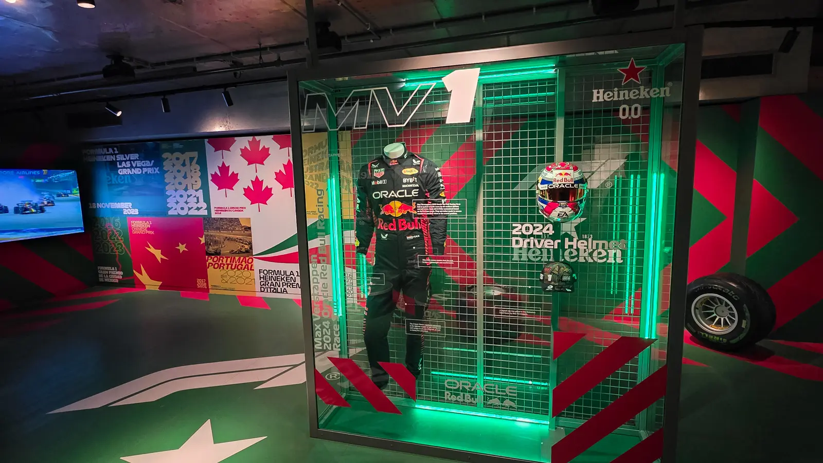 Max Verstappen's 2024 Red Bull race suit and helmet in the F1 room at the Heineken Experience in Amsterdam