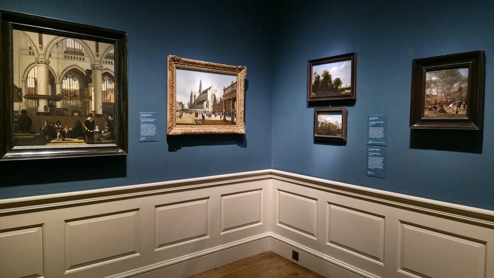 A corner of the National Gallery's Dutch rooms in London, with Berckheyde's sunlit Haarlem market square and small Vroom and van der Heyden landscapes