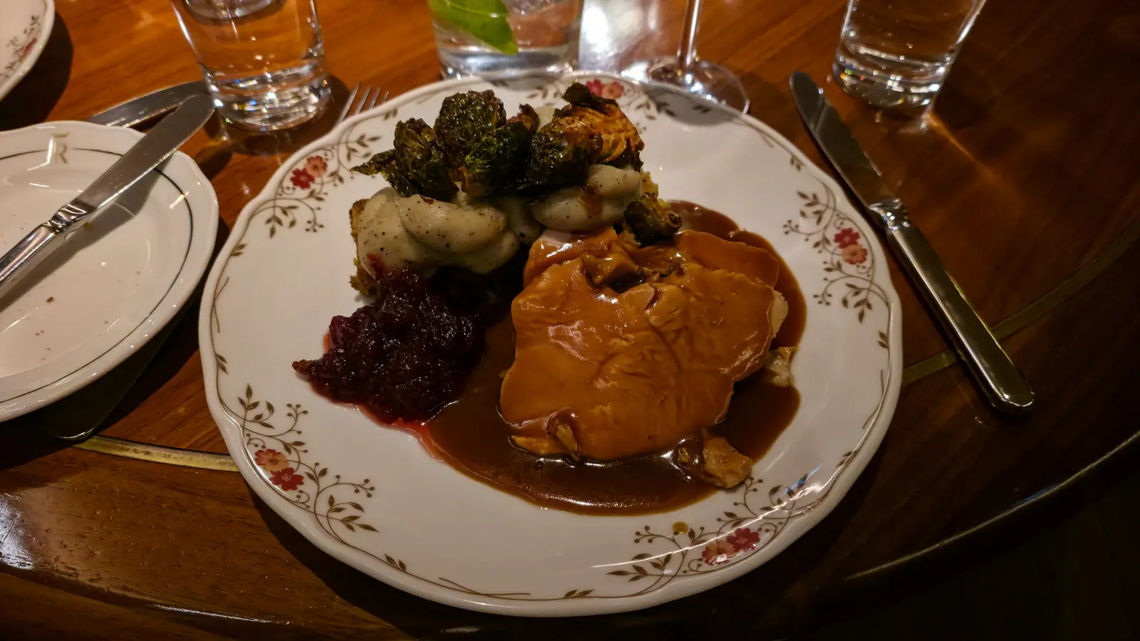 Turkey breast in gravy with cranberry chutney, truffle mashed potatoes, stuffing and crispy Brussels sprouts, Reign, Toronto