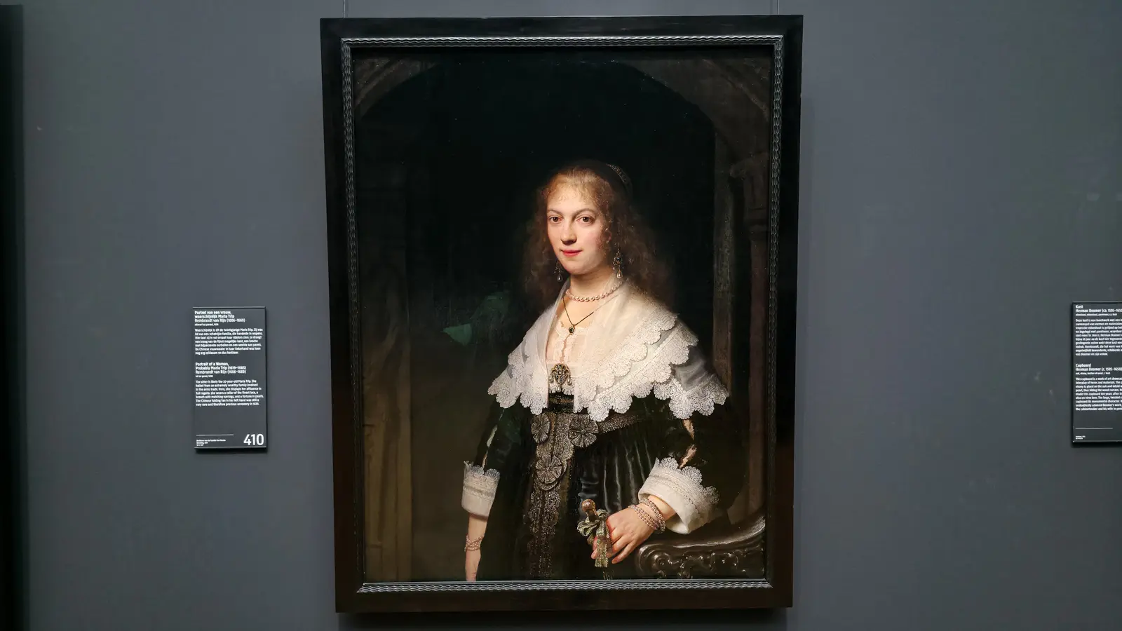 Rembrandt's Portrait of a Woman, probably Maria Trip, at the Rijksmuseum, in a lace collar and pearls with a folding fan