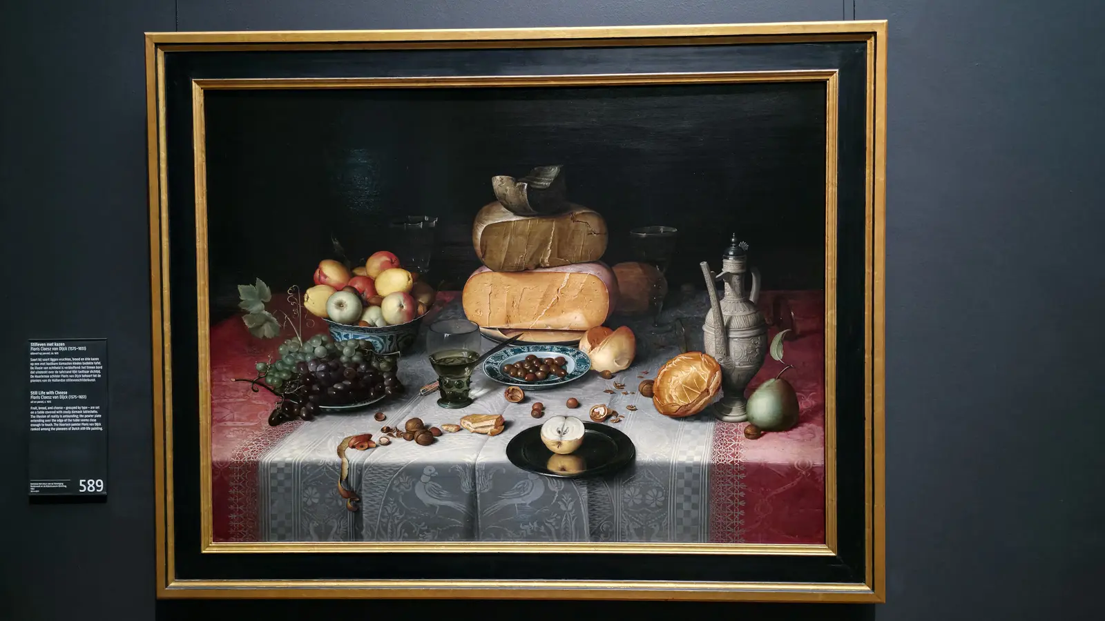 Floris van Dijck's Still Life with Cheese, stacked cheeses, fruit and bread on a damask-covered table, Rijksmuseum Amsterdam