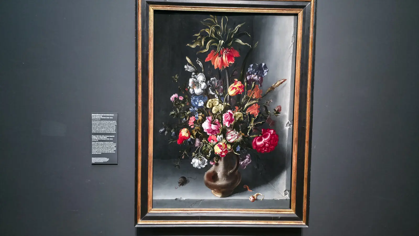 Jacob Vosmaer's Flower Still Life at the Rijksmuseum, an orange crown imperial above tulips and irises in a stone niche