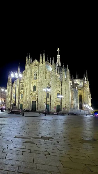 There’s something quietly magical about Milan at night
